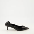 Worn Leather Pumps